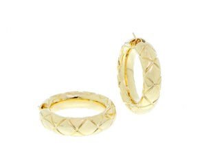 Yellow gold hoops with an engraved diamond pattern