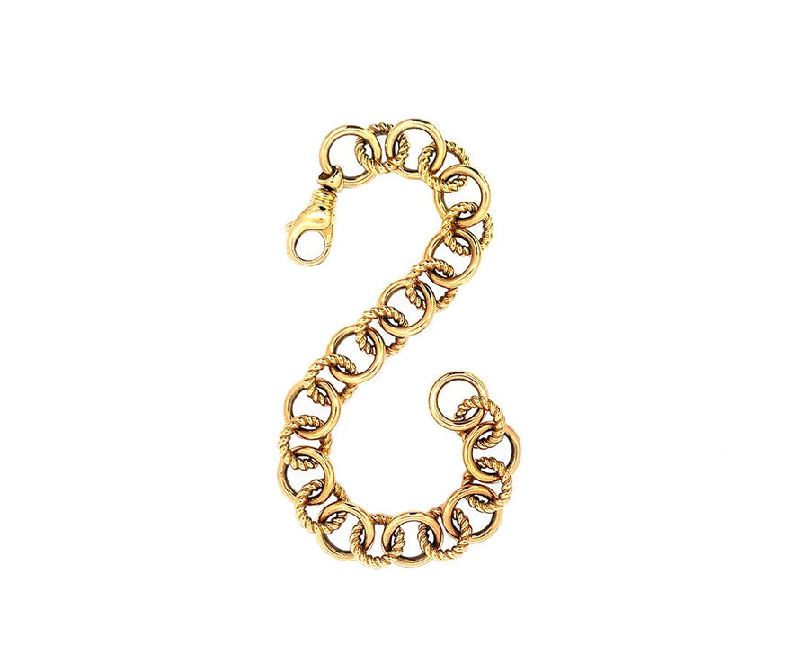 Yellow gold round torned and smooth chain bracelet