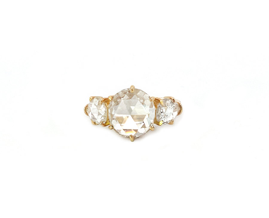 Yellow gold ring with a rose cut diamond and two pear shaped rose cut diamonds