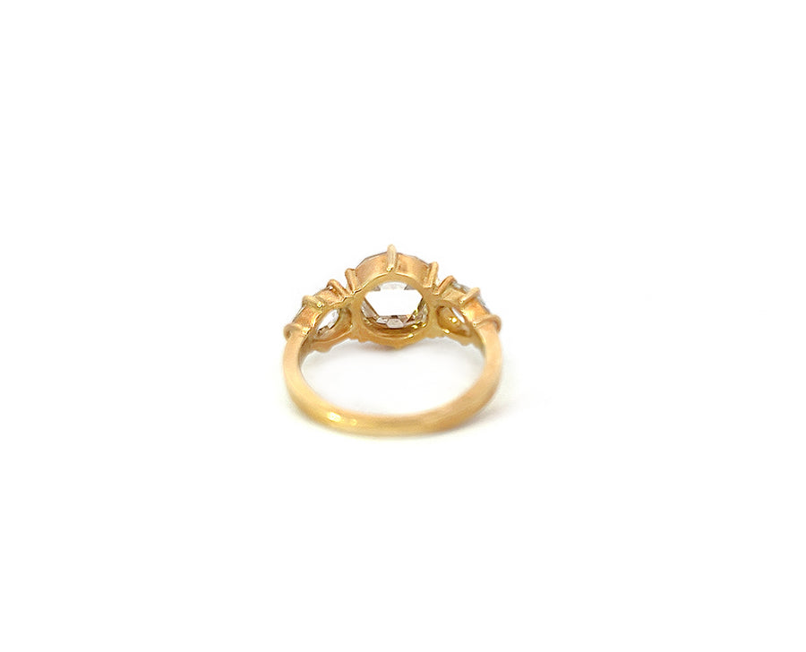 Yellow gold ring with a rose cut diamond and two pear shaped rose cut diamonds