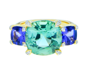 Yellow gold ring with a green tourmaline and tanzanites