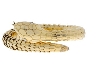 Yellow gold snake bracelet with diamond eyes and tail