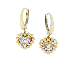 Yellow gold hoop earrings with diamond heart pendants
