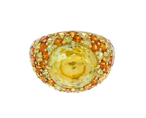 Yellow gold ring with yellow sapphire, spessartite garnets
