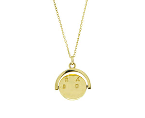 Yellow gold necklace with a rotating -i love you- coin
