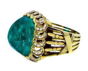 Yellow gold and diamond ring with a cabochon cut emerald