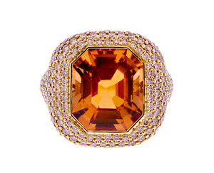 Yellow gold ring with a tourmaline and brown diamonds