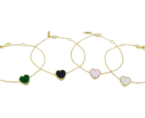 Yellow gold bracelet with a heart charm