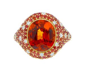 Yellow gold ring with a spessartite, diamonds and sapphires
