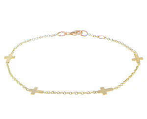 Yellow gold bracelet with 4 cross charms