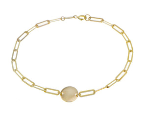 Yellow gold chain bracelet with a small coin charm