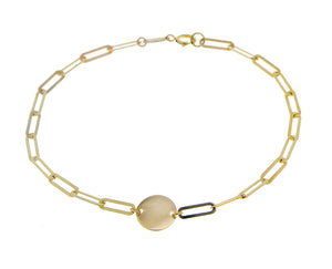 Yellow gold chain bracelet with a smell coin charm