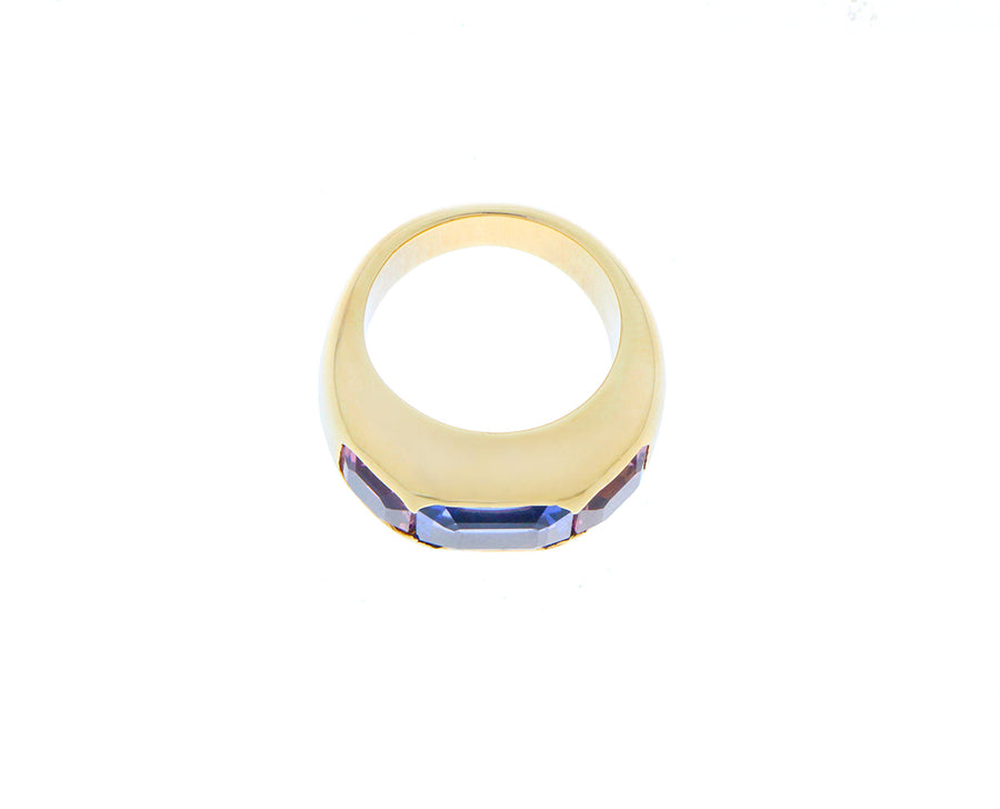 Yellow gold gypsy ring with tanzanite and pink tourmaline