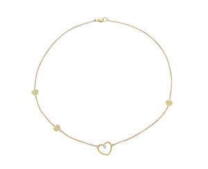 Yellow gold necklace with heart charms and a diamond