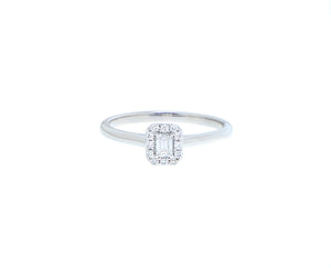 White gold ring with baguette and entourage