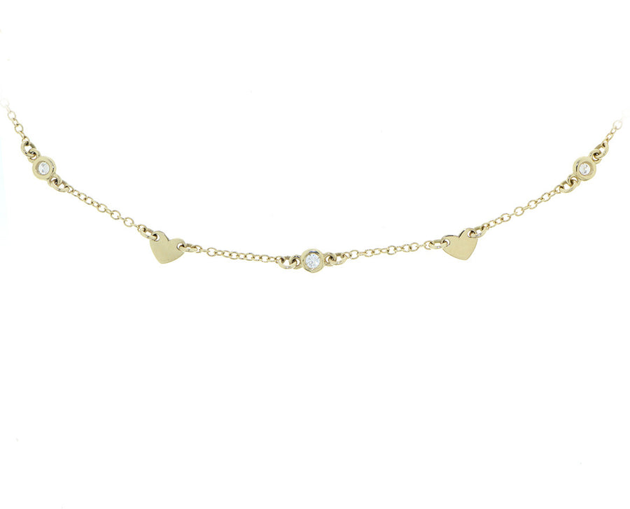 Yellow gold and diamond necklace with heart charms