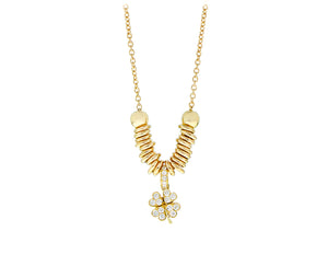 Yellow gold necklace with rings and a diamond clover pendant