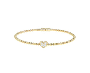 Yellow gold ball bracelet with a diamond heart