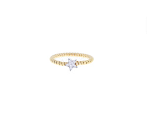 Yellow gold tubo ring with a diamond star