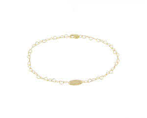 Yellow gold heart chain bracelet with a tag