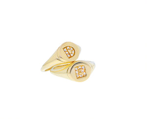 Yellow gold signet ring with a diamond letter