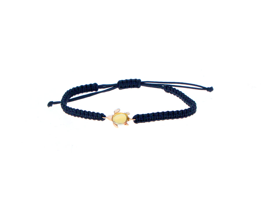 Knotted rope bracelets with a rose gold and gemstone turtle charm