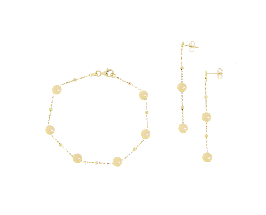 Yellow gold bracelet with round charms