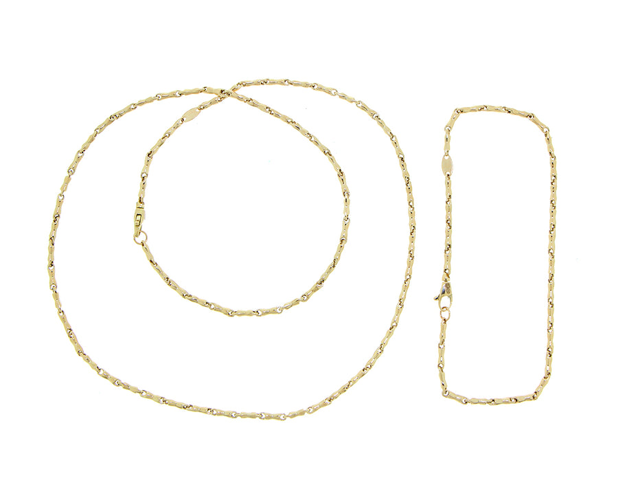 Yellow gold necklace with pieces