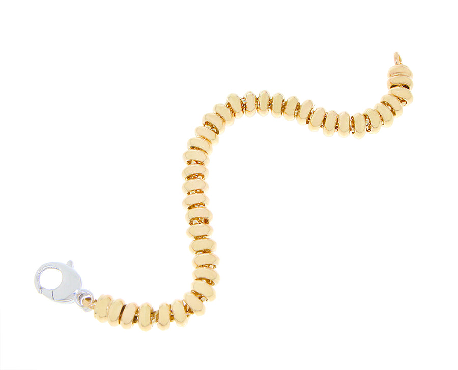 Yellow gold ring bracelet with a white gold clasp closure