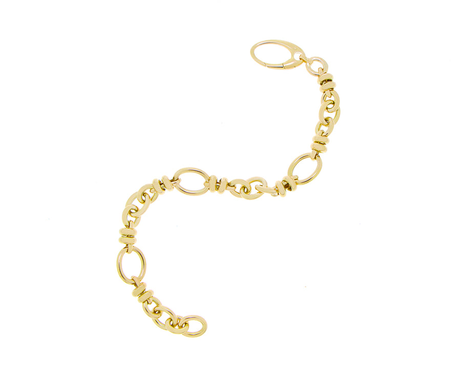 Yellow gold chain bracelet with rings