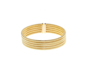 Yellow gold tubo band bracelet