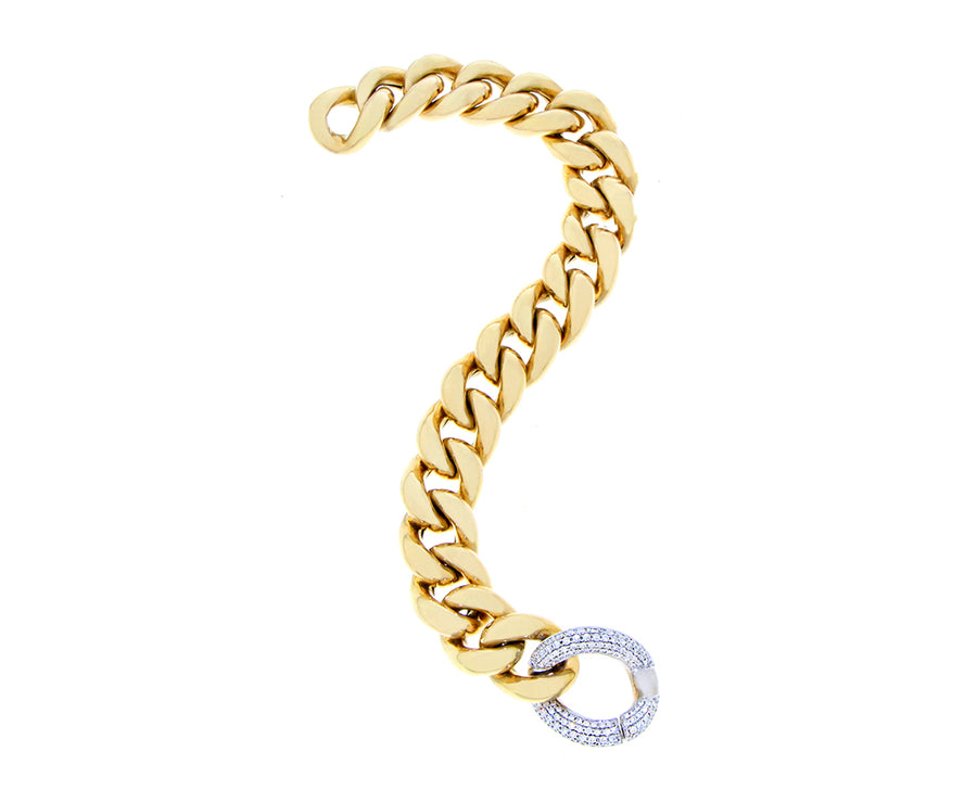 Yellow gold gourmet chain bracelet with a diamond link closure