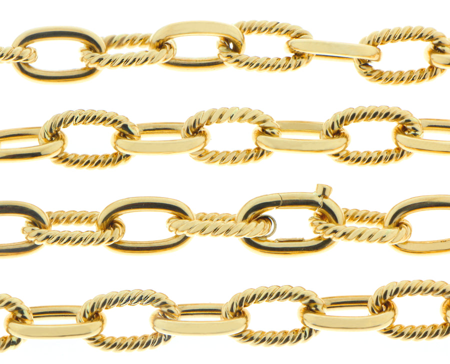 Geelgouden sautoir met gedraaide colliers