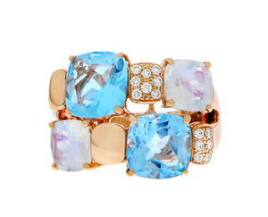 Rose gold ring with blue topaz, moonstone and diamonds