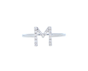 White gold ring with a diamond letter M