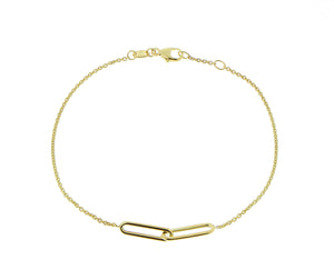 Yellow gold bracelet with two chain charms