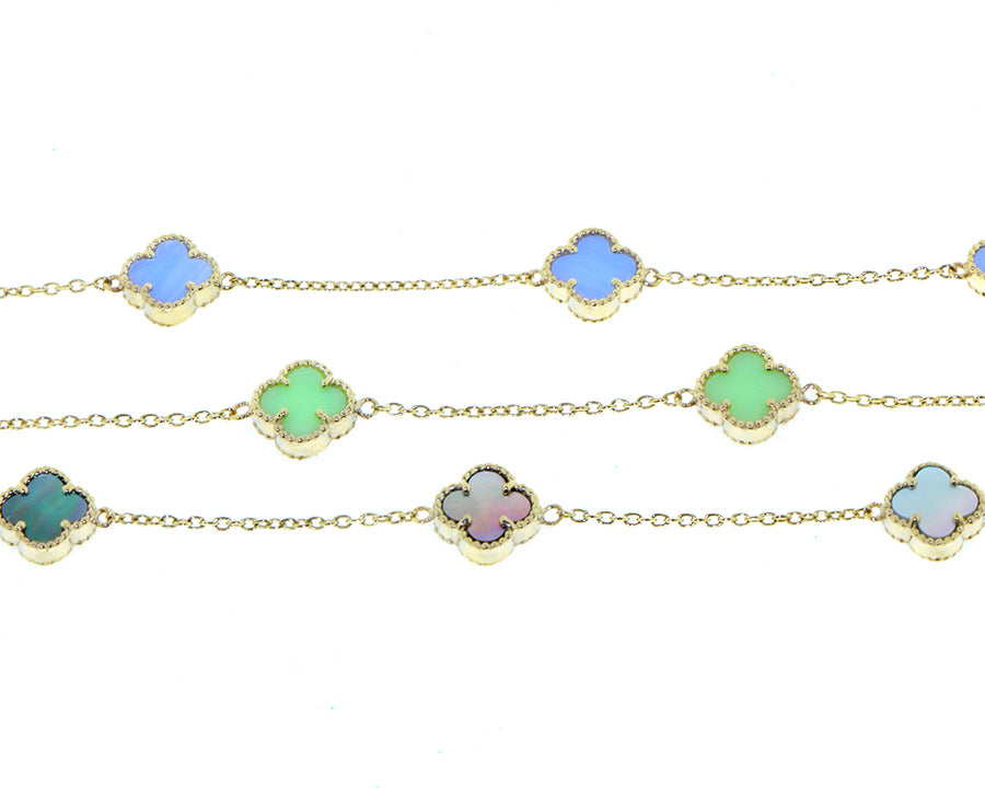 Yellow gold bracelets with tiny alhambra charms
