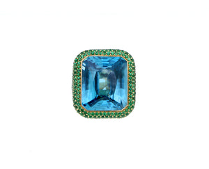 Geelgouden ring met blauwe zirkoon en tsavoriet