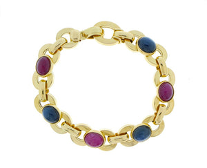 Yellow gold bracelet with cabochon cut ruby and sapphire