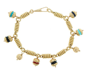 Yellow gold bracelet with small dangling pendants