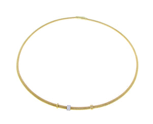 Yellow gold tubo necklace with flexible diamond element