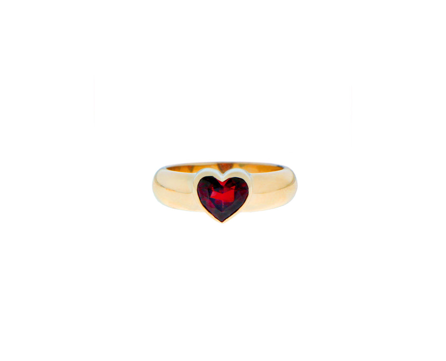 Yellow gold ring with a heart shaped green tourmaline, topaz or garnet