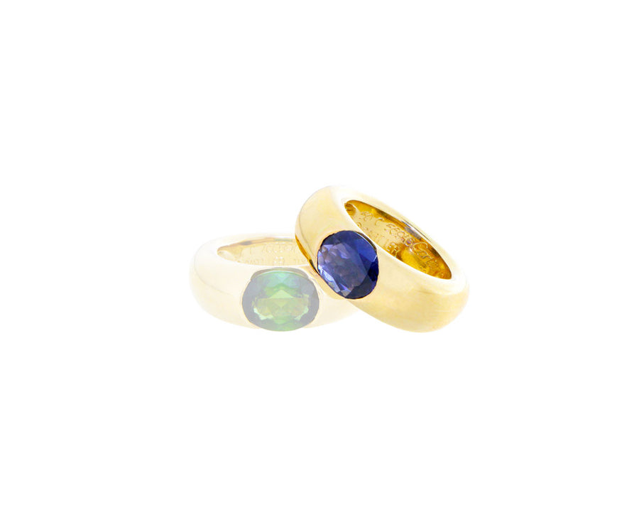 Yellow gold "ellipse" ring with iolite or tourmaline