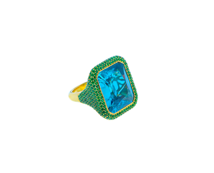 Yellow gold ring with a blue zircon and tsavorites