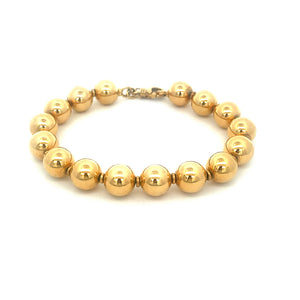 Yellow gold ball bracelet