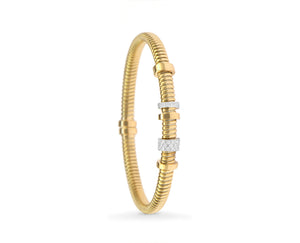 Yellow gold tubo bracelet with flexibel diamond elements