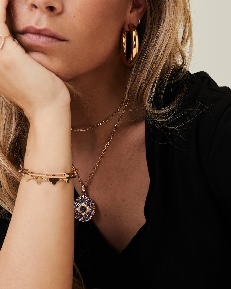 Roségouden sautoir met een hanger van roze en blauwe saffier en diamanten oog