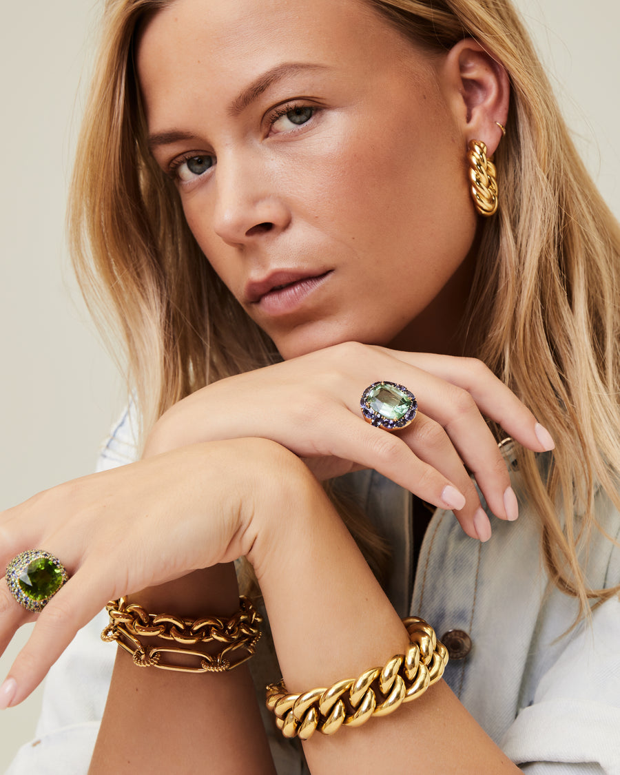 Armband van geelgoud met ronde gedraaide en lange ovale gladde kettingen