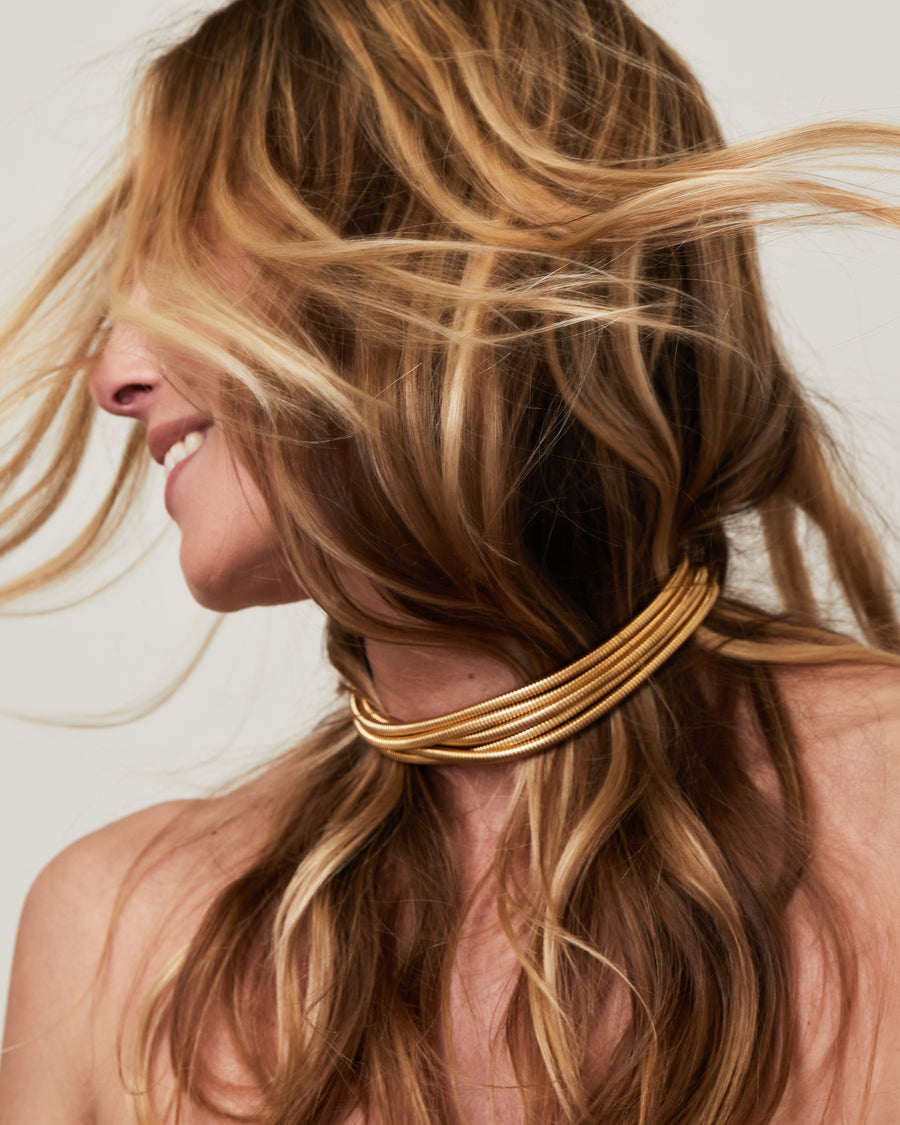 Yellow gold 5 row tubo necklace