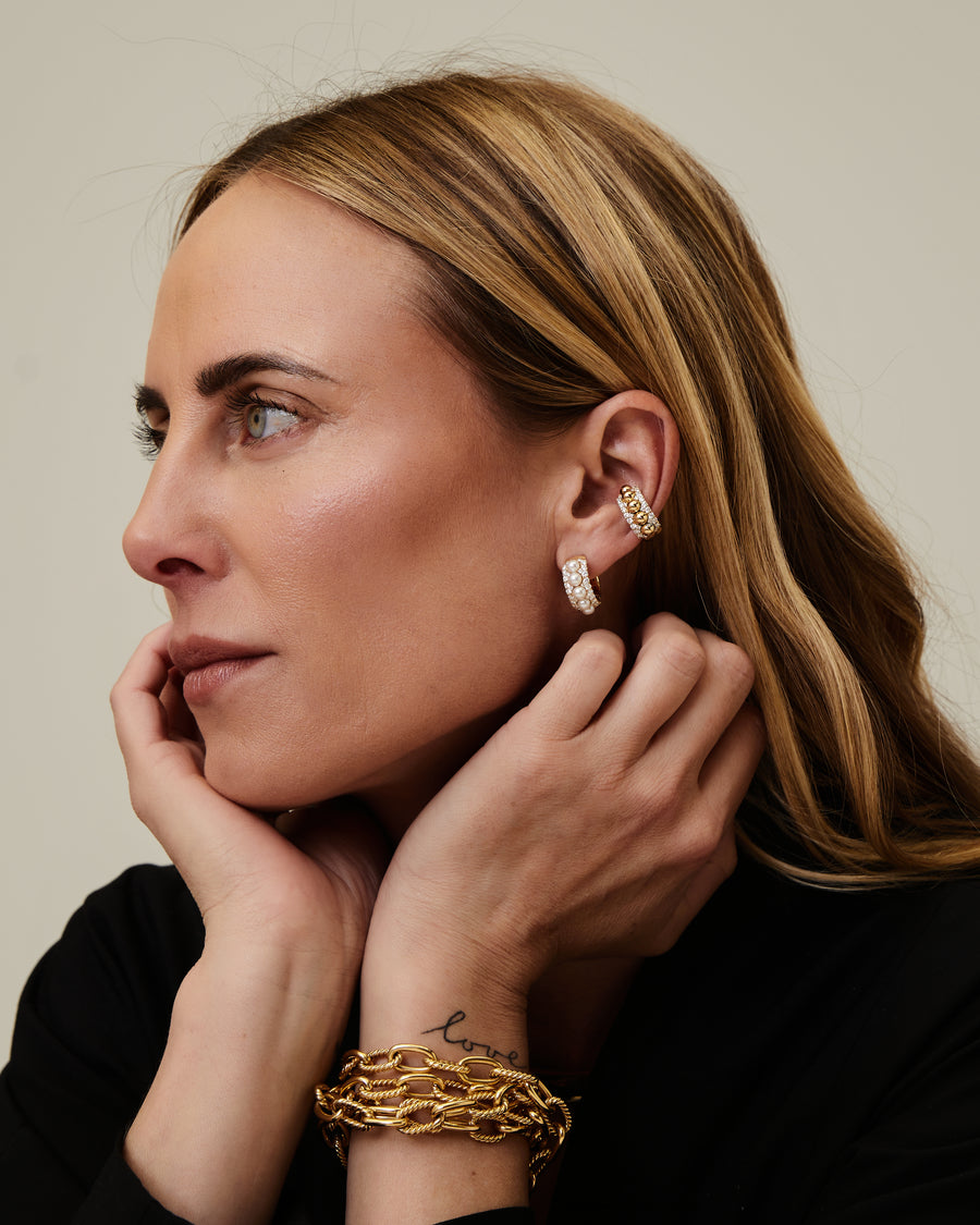 Geelgouden sautoir met gedraaide colliers